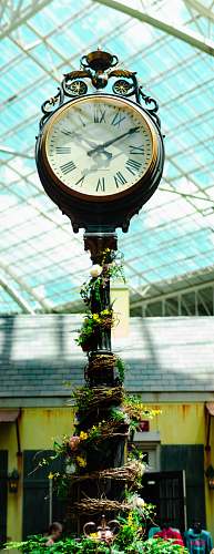 architecture round black framed analog clock clock tower