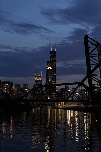architecture silhouette of bridge near buildings arch