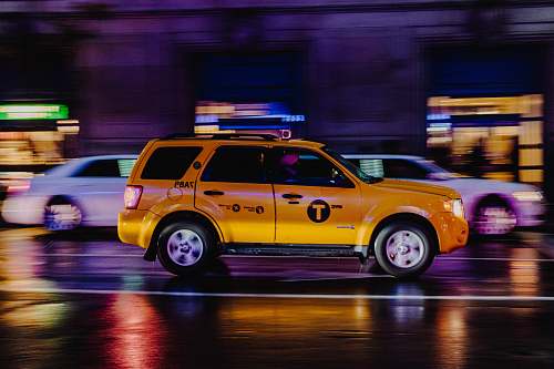 taxi yellow SUV vehicle