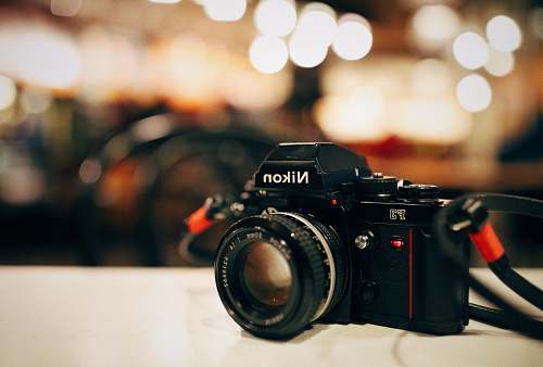 nikon selective focus photography of black Nikon MILC-camera boston