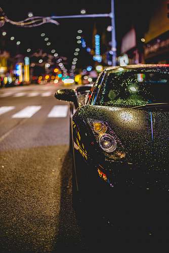 automobile close photography of black convertible on road transportation