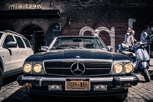 vehicle closeup photo of classic black Mercedes-Benz car transportation