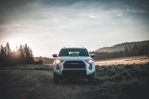 automobile parked white Toyota vehicle transportation