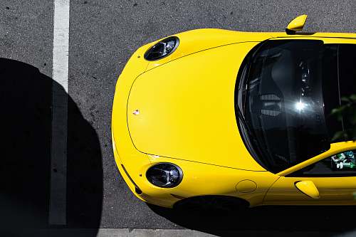 tire yellow Porsche car miami design district