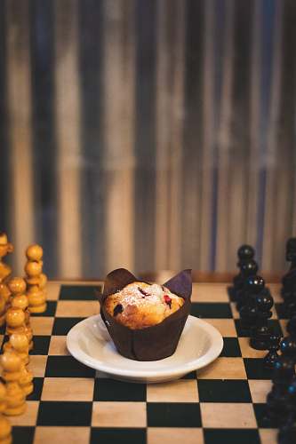 game cupcake with white powdered sugar food