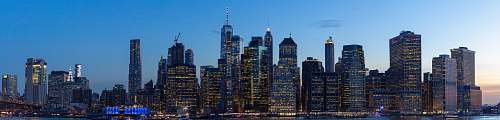 building city skyline during night time high rise