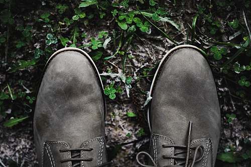 footwear flat lay photography of black shoes shoe