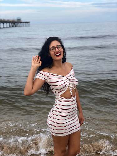 apparel smiling woman wearing white and red dress lauderdale-by-the-sea