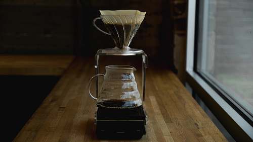 hourglass coffee pitcher on table near window jackson
