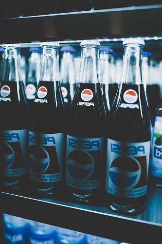 beverage Pepsi bottles on cooler drink