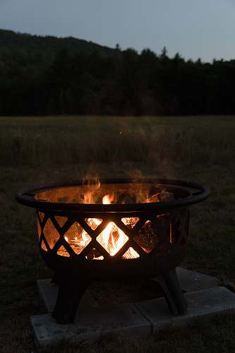 flame round black fire pit during daytime newry