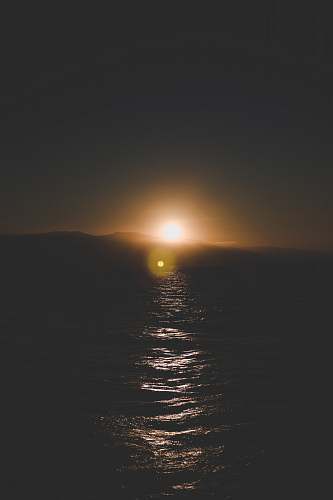 light sunrise over water santa monica pier