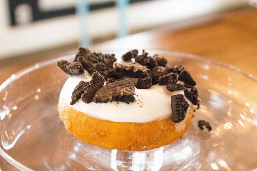 dessert chocolate toppings donut on clear glass tray cookie