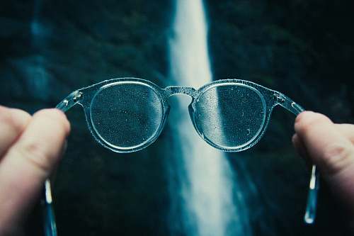 goggles person holding eyeglasses portland