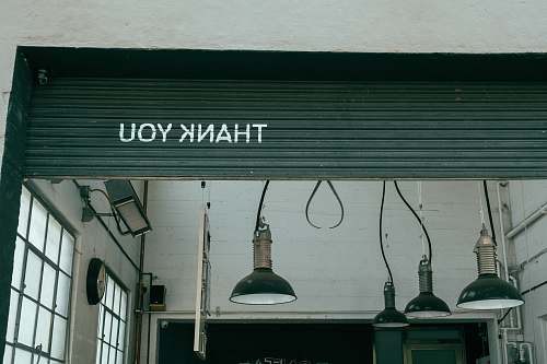 sign assorted pendant lights hanging on ceiling garage door