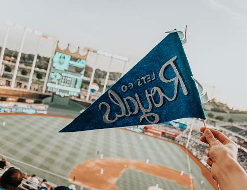 person blue and white Lets Go Royal pennant flag