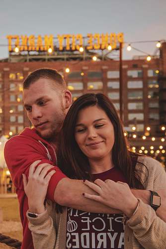 person couple hugging each other ponce city market