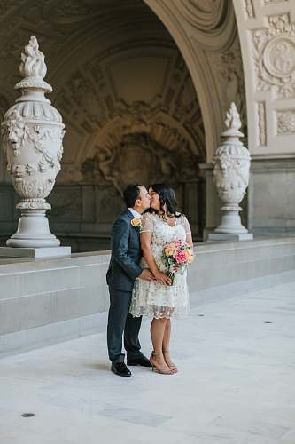 people man and woman kissing person