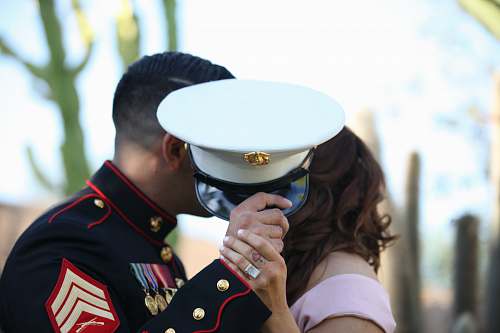 person man covering his face with cap people