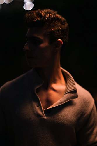person man in brown polo shirt portrait photo people