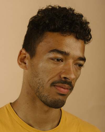 person man wearing yellow shirt face