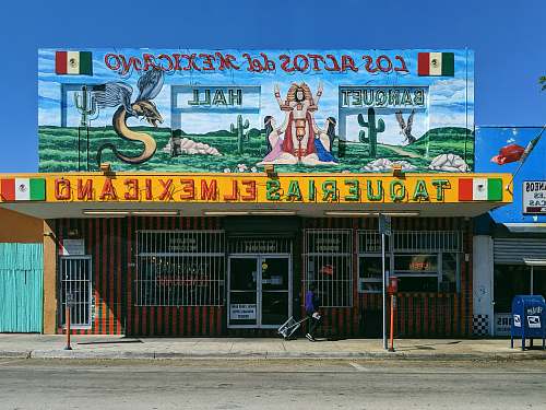 person multicolored taquerias el mexicano storefront 618 sw 8th st
