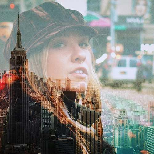 person New York City and woman's face overlay city