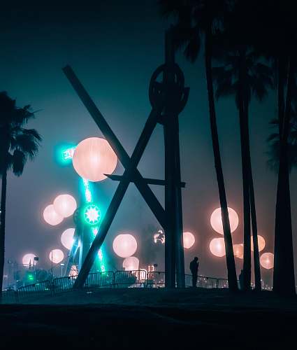 person paper lanterns at night lighting