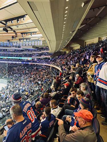 person people in stadium crowd