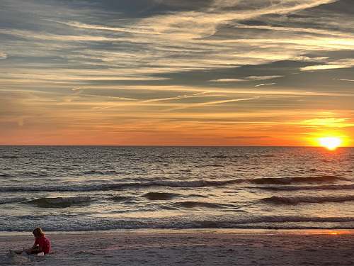 nature people sitting on seashore outdoors