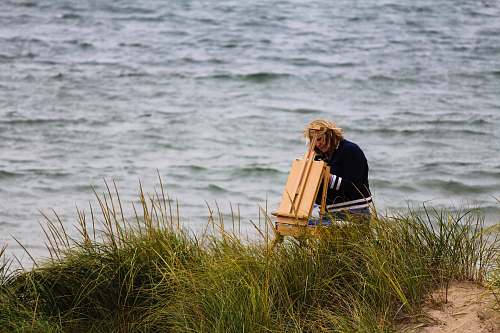 people person standing at the back of an easel person