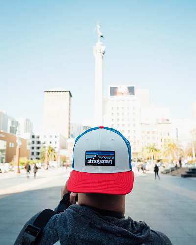 apparel person wearing cap clothing