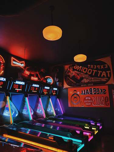 person red and blue arcade machine st. louis