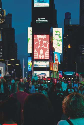 person red Coca Cola LED signboard people