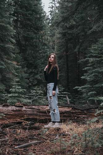 person shallow focus photography of woman in black sweater people