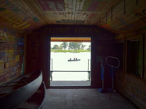 person two black canoes flooring