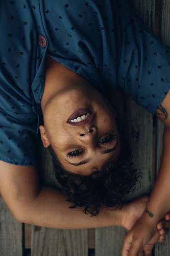 person woman lying on dock people