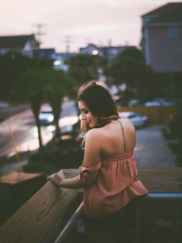 people woman standing in balcony person