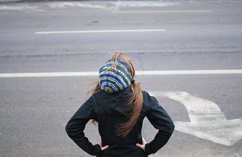 people woman standing near road person