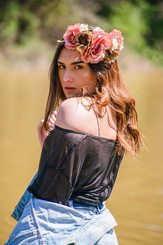 people woman wearing pink floral headband person