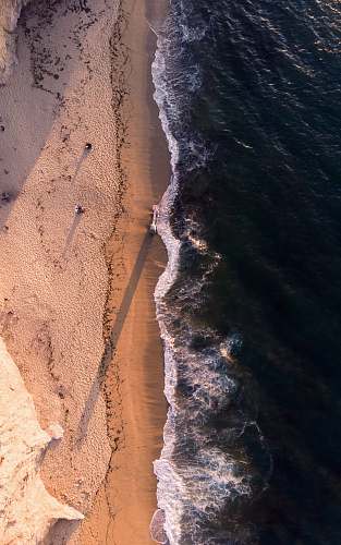 nature high-angle photo of shoreline and body of water outdoors