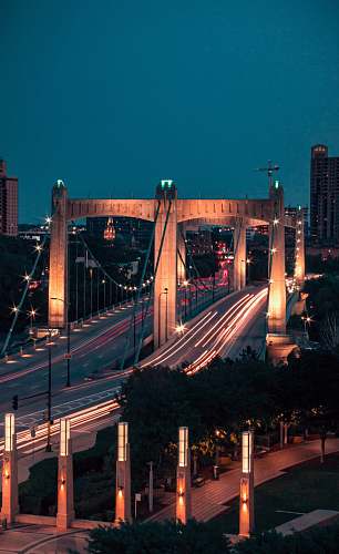 bridge brown bridge during daytime time lapse photography night