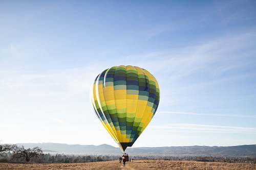 balloon yellow and blue hot air balloon at the ground hot air balloon