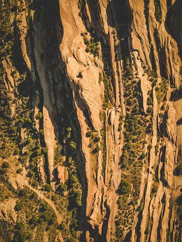 landscape aerial photography of mountain with green trees aerial view