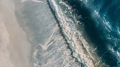 outdoors aerial photography of sea wave water