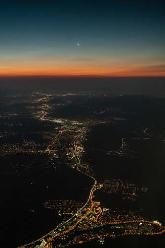 dawn aerial view photo of gray city dusk