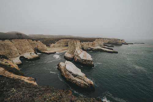 outdoors bird's-eye view photography of ocean land
