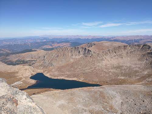 outdoors brown mountain under blue sky mountain