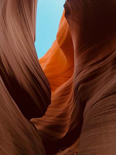 mountain brown rock formation under blue sky during daytime outdoors