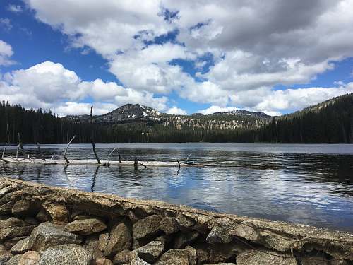 outdoors gray stones near body of water water